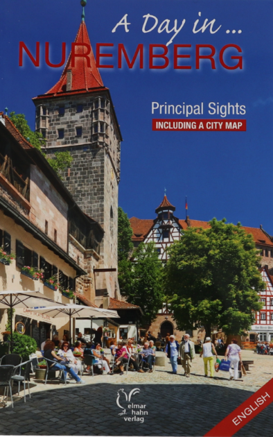 Ein englischer Reiseführer mit dem Titel „A Day in... NUREMBERG“ zeigt auf dem Cover den belebten Tiergärtnertorplatz in Nürnberg mit seinen historischen Fachwerkhäusern und dem markanten Neuturm unter blauem Himmel.